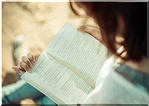 A girl reads a book