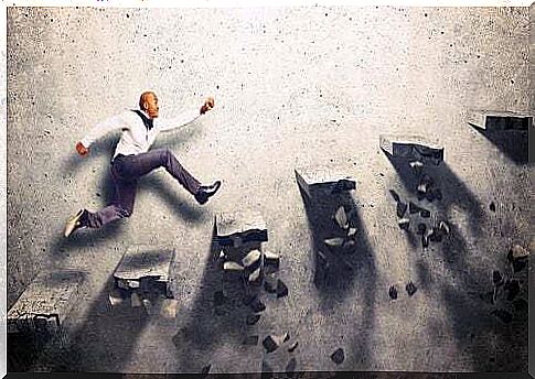 Businessman climbing over breaking steps.