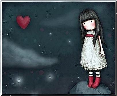 sad little girl with heart