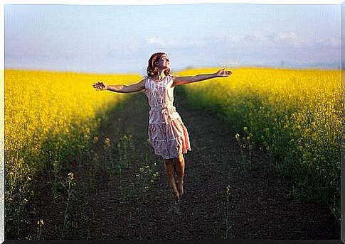 Happy woman in a field