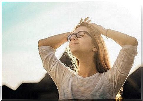 Girl breathing with closed eyes.