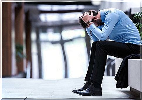 Desperate office worker suffering from unhappiness at work